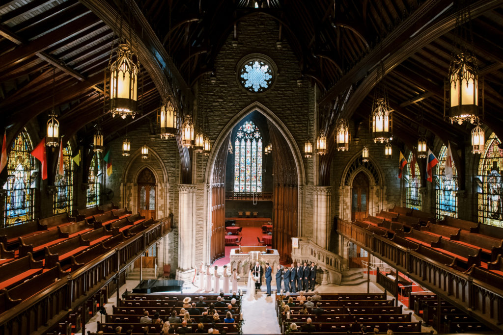A photograph of the service from the balcony captures the elegance of this wedding in Pittsburgh.